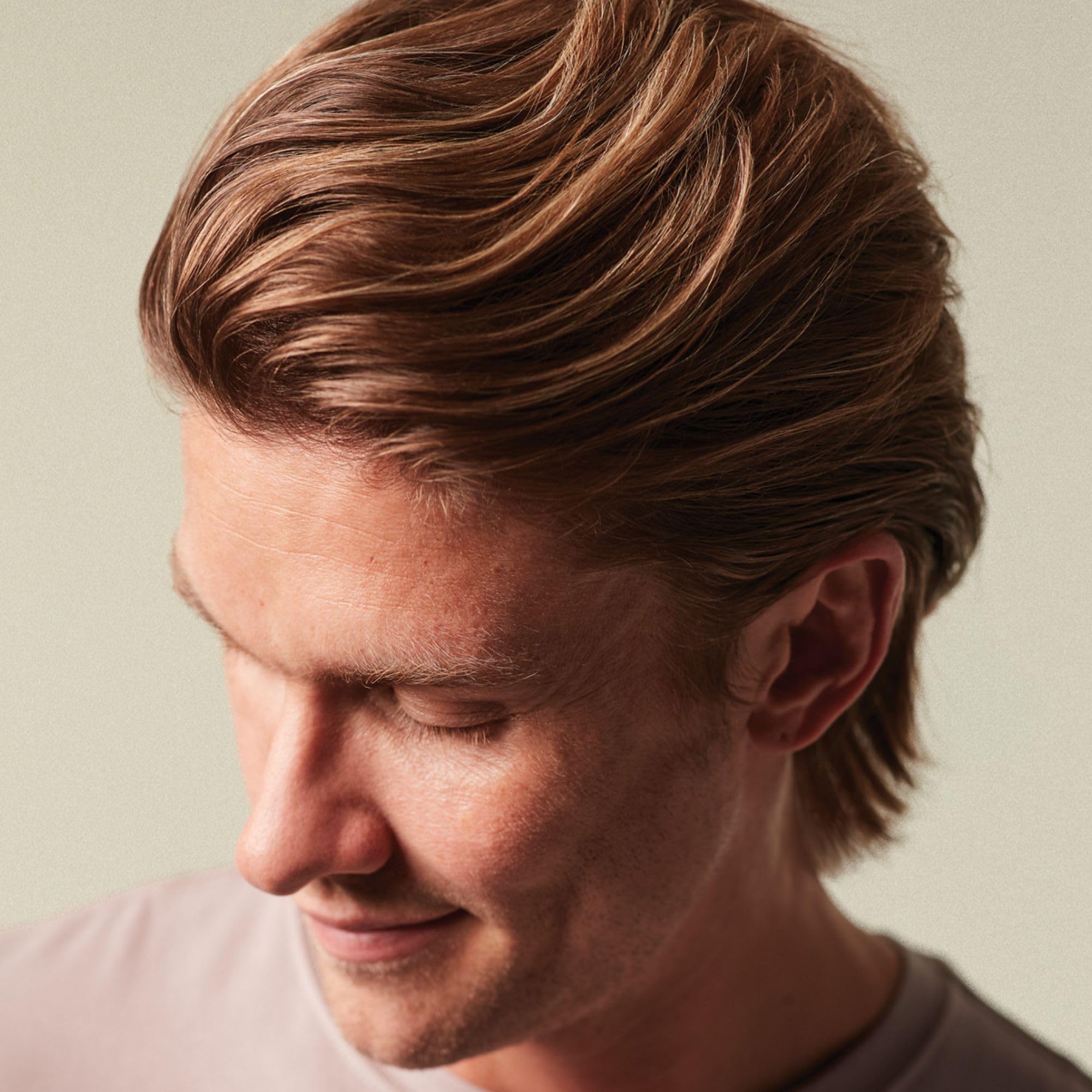 MITCH applied to damp hair demonstrating root lift before blow-dry