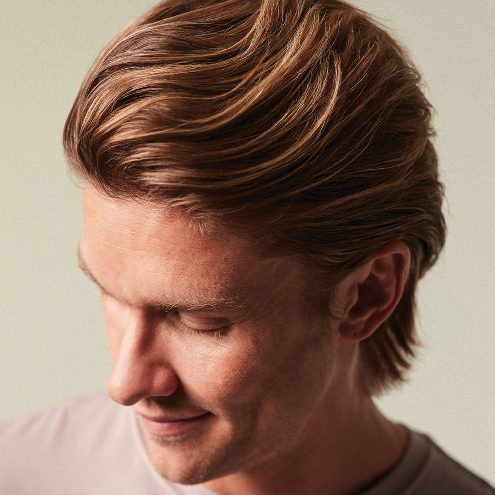 MITCH applied to damp hair demonstrating root lift before blow-dry