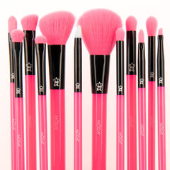 MODA brushes held in hand for scale, demonstrates comfortable grip benefit