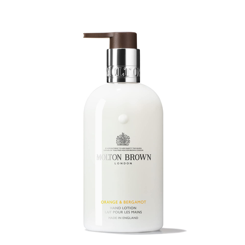 Molton Brown hand lotion bottle front view showing citrus label and travel-ready benefit