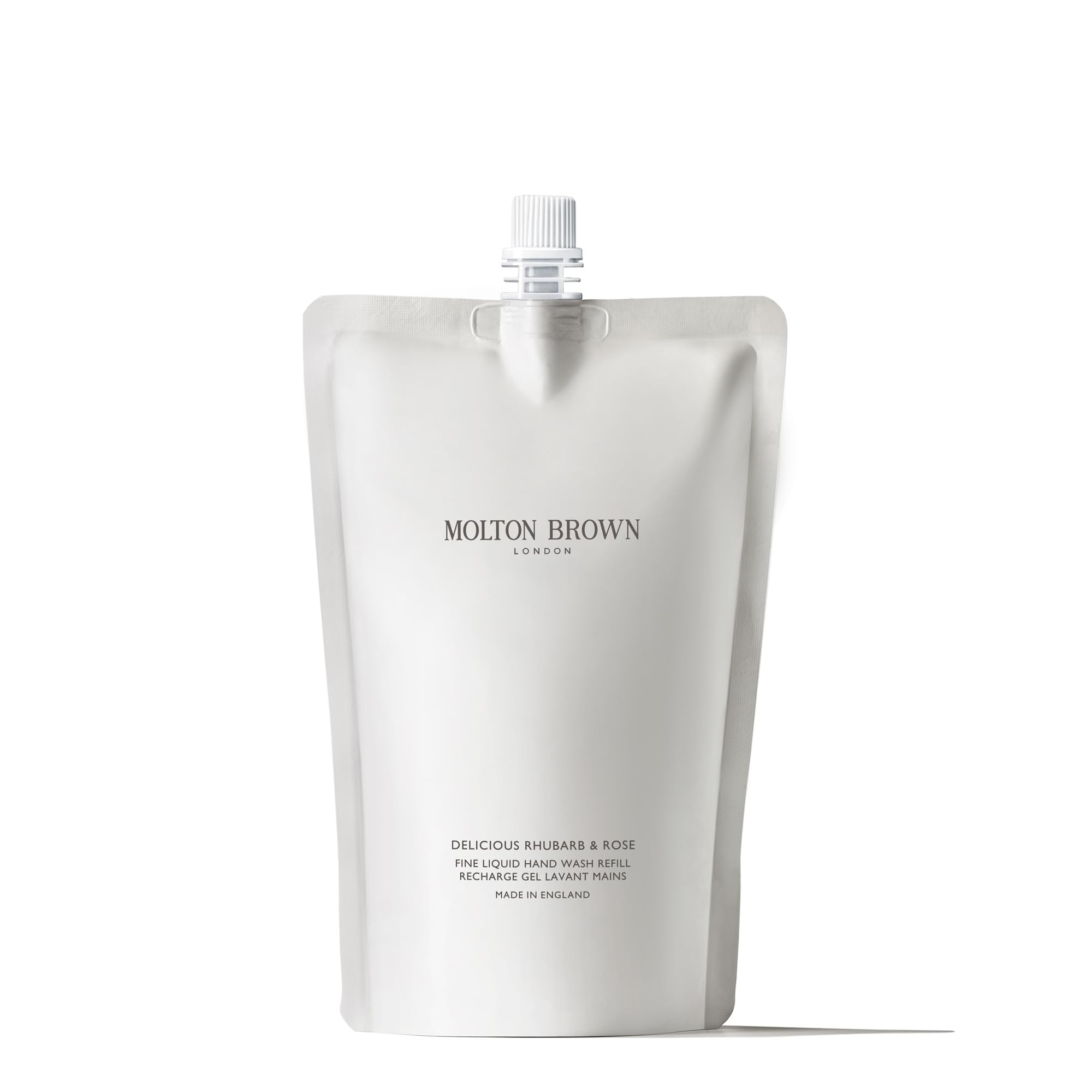 Molton Brown refill pouch front view showing branding and scent, convenience for eco-friendly topping up