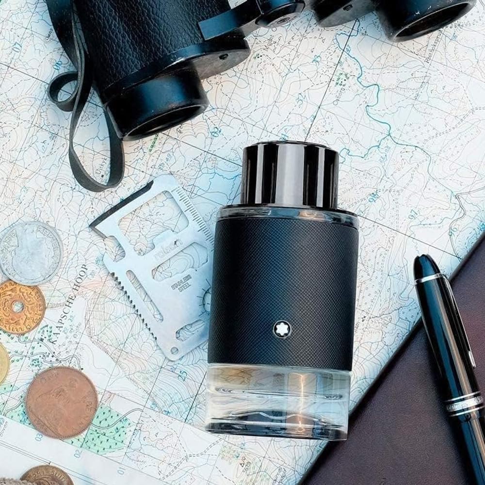 Montblanc Explorer raw ingredients display with bergamot and vetiver emphasizing natural notes