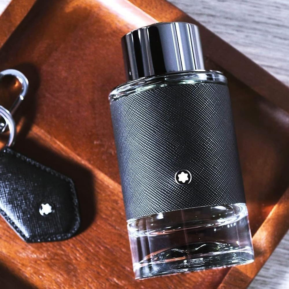 Montblanc Explorer bottle beside razor for scale showing everyday carry suitability