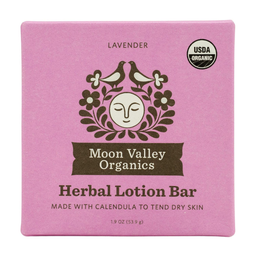 Moon Valley Organics front packaging showing lavender lotion bar benefits