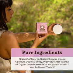 Moon Valley Organics lotion bar held in hand showing portable size benefit