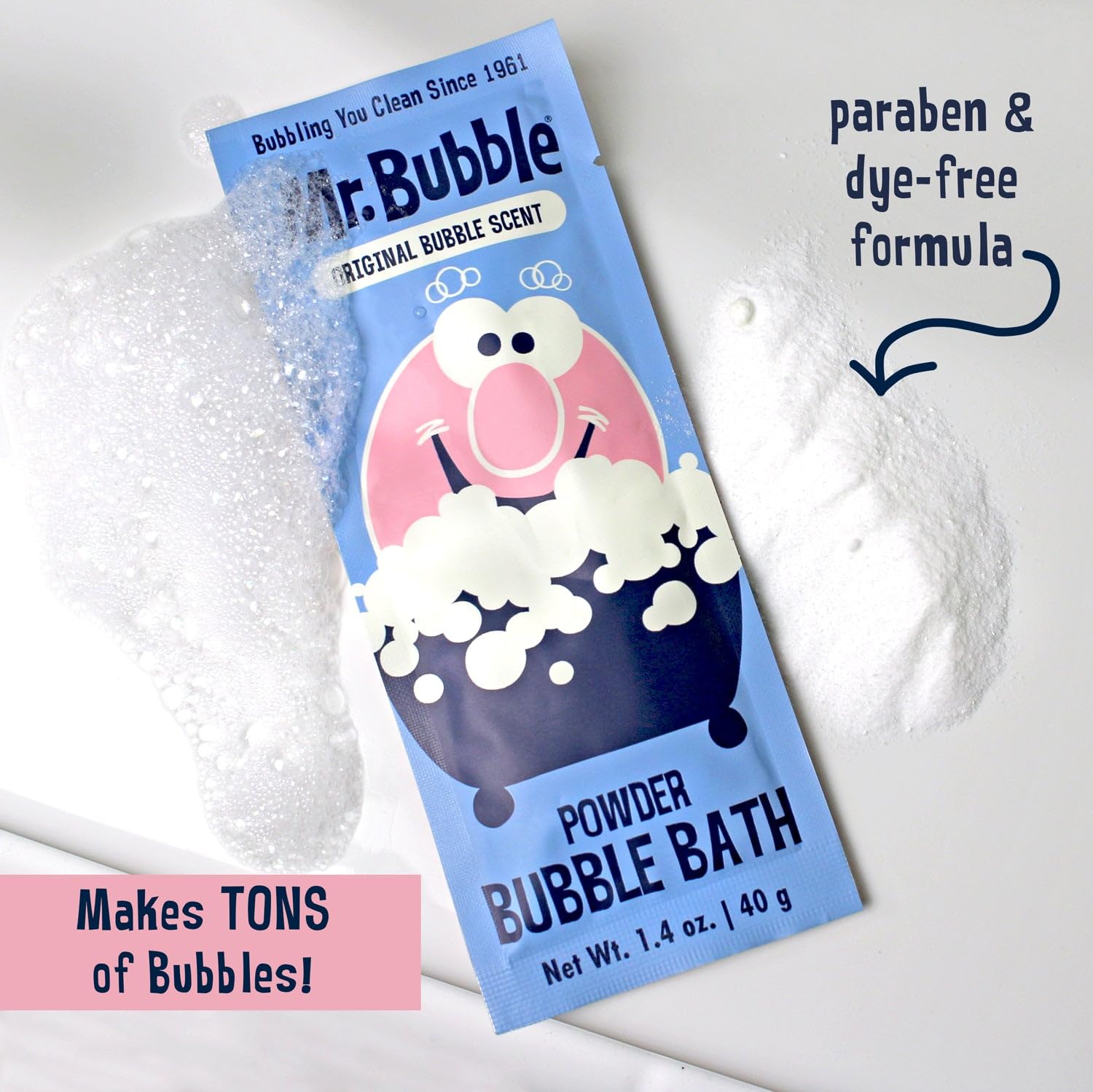 Mr. Bubble scale comparison hand holding packet showing compact travel convenience
