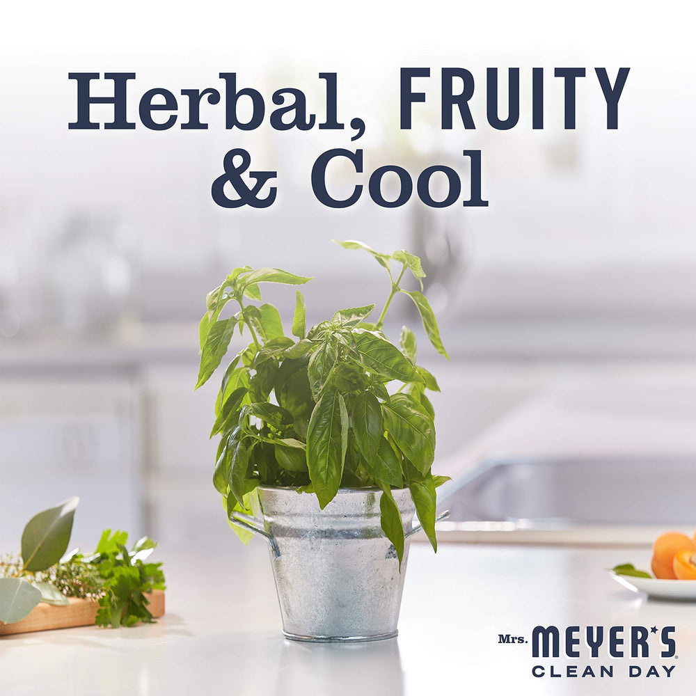 Mrs. MEYER'S ingredient flatlay with olive oil and aloe vera emphasizing natural ingredients