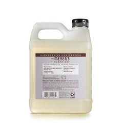 Mrs. MEYER'S pouring refill into a dispenser demonstrating easy refill and reduced waste