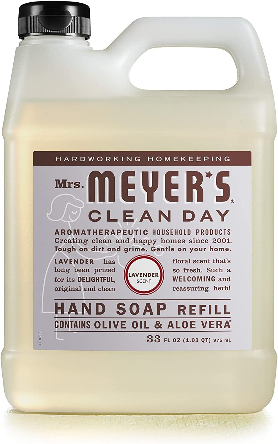 Mrs. MEYER'S Plumberry bottle styled with fresh plums, illustrating bright fruity fragrance appeal
