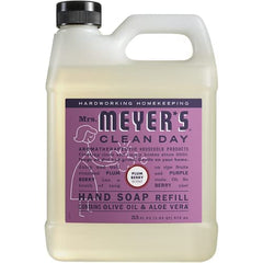 Mrs. MEYER'S Rainwater refill being poured into a sink pump, showing easy refill and convenience