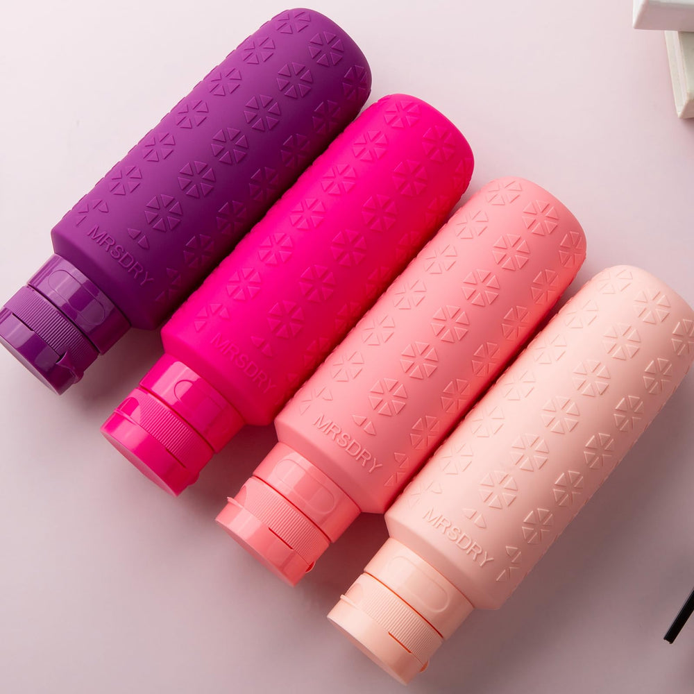 Mrsdry four bottles flatlay showing cohesive set and storage ease