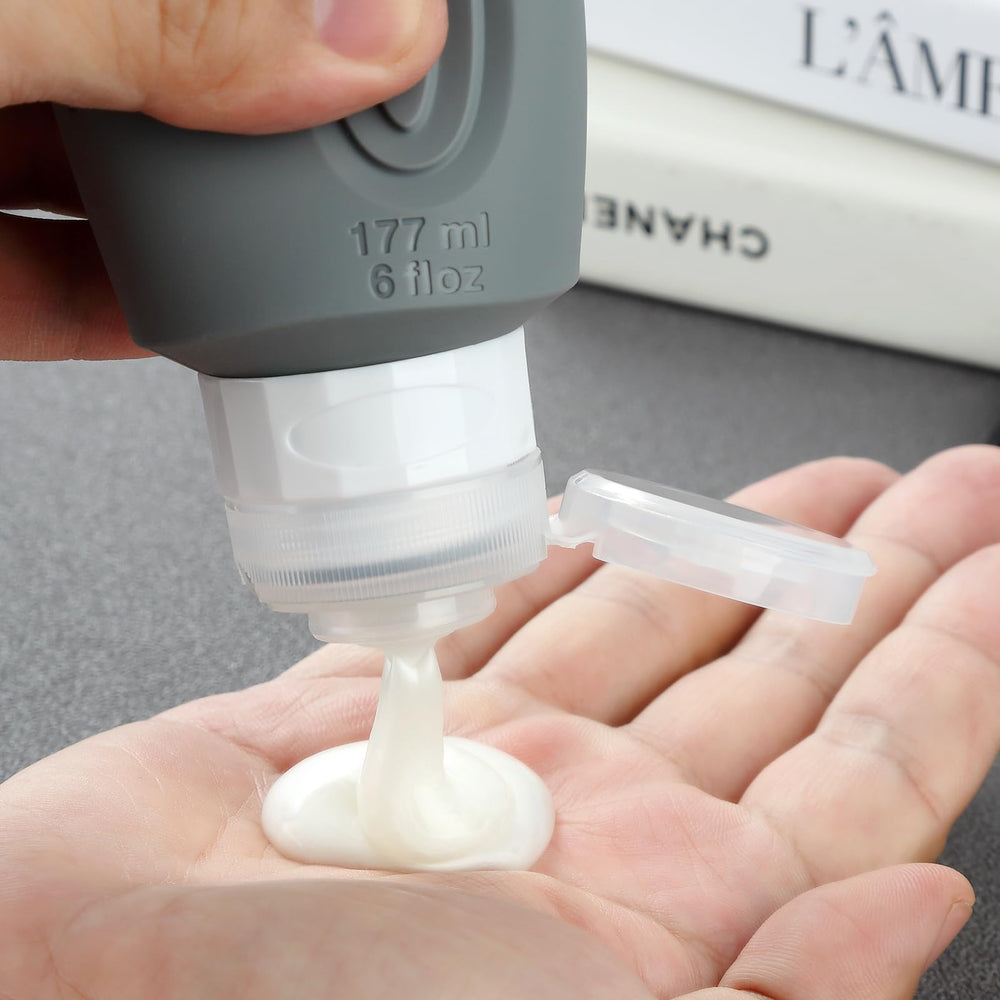Mrsdry bottle being filled from a large shampoo container for quick refills