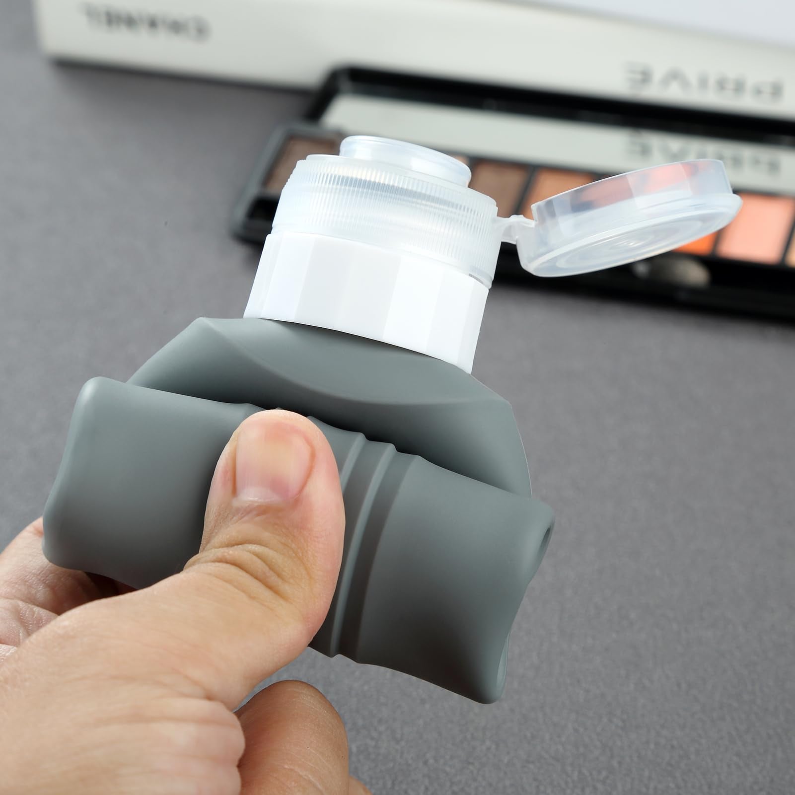 Mrsdry packed suitcase with bottles in toiletry bag illustrating leak-safe travel