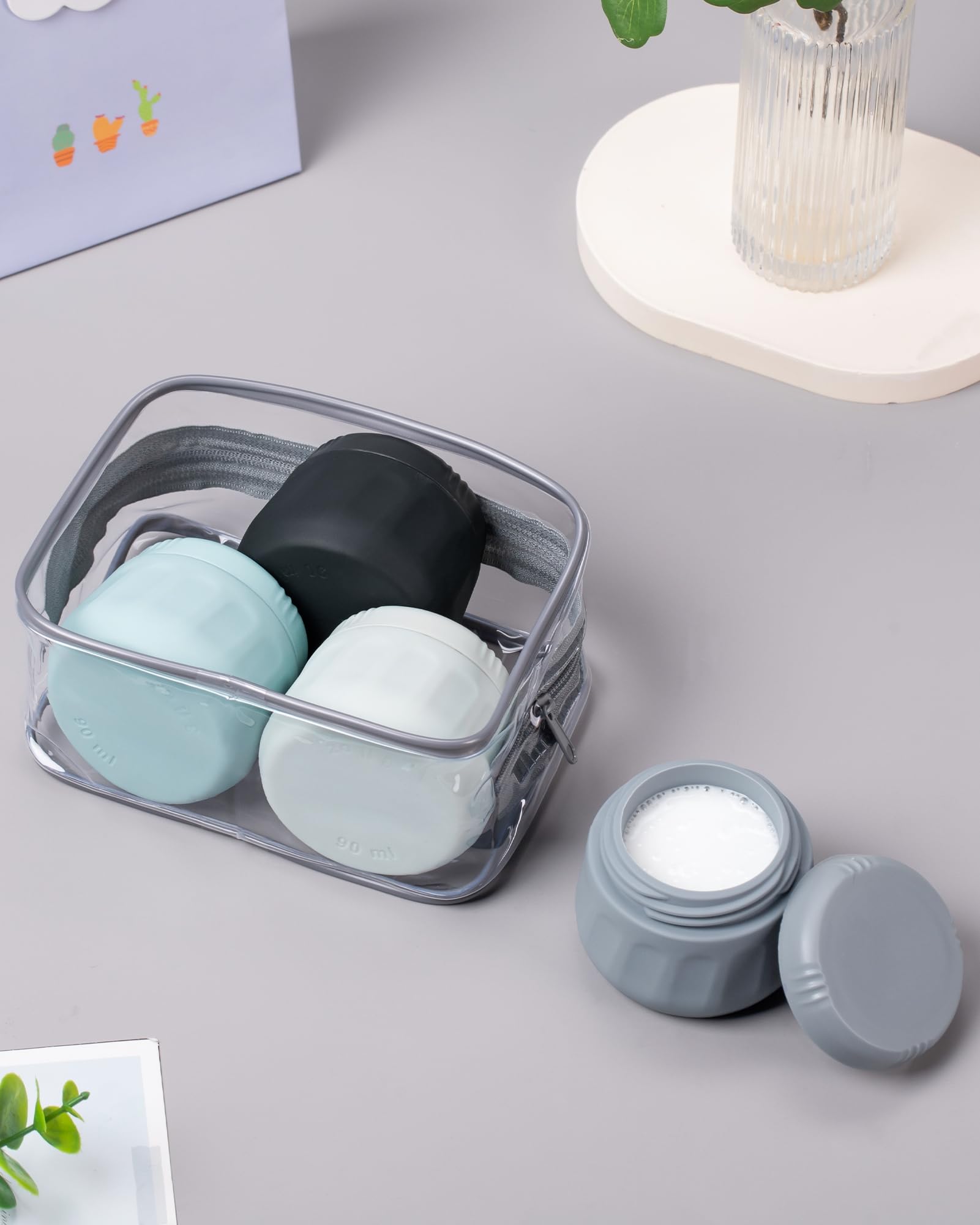 Mrsdry jar next to credit card to show compact travel-ready scale