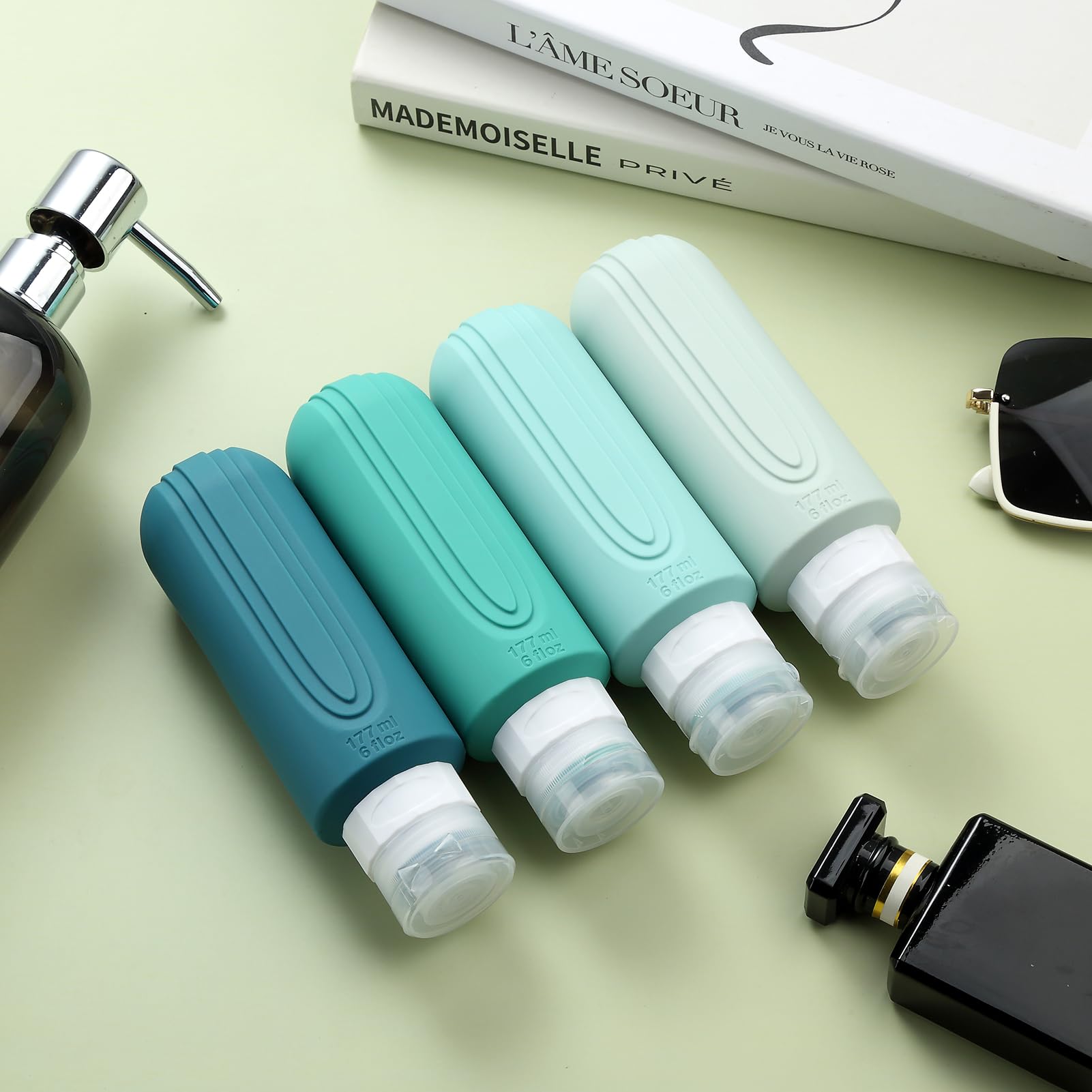Mrsdry bottle next to passport and boarding pass, 6oz travel-friendly capacity