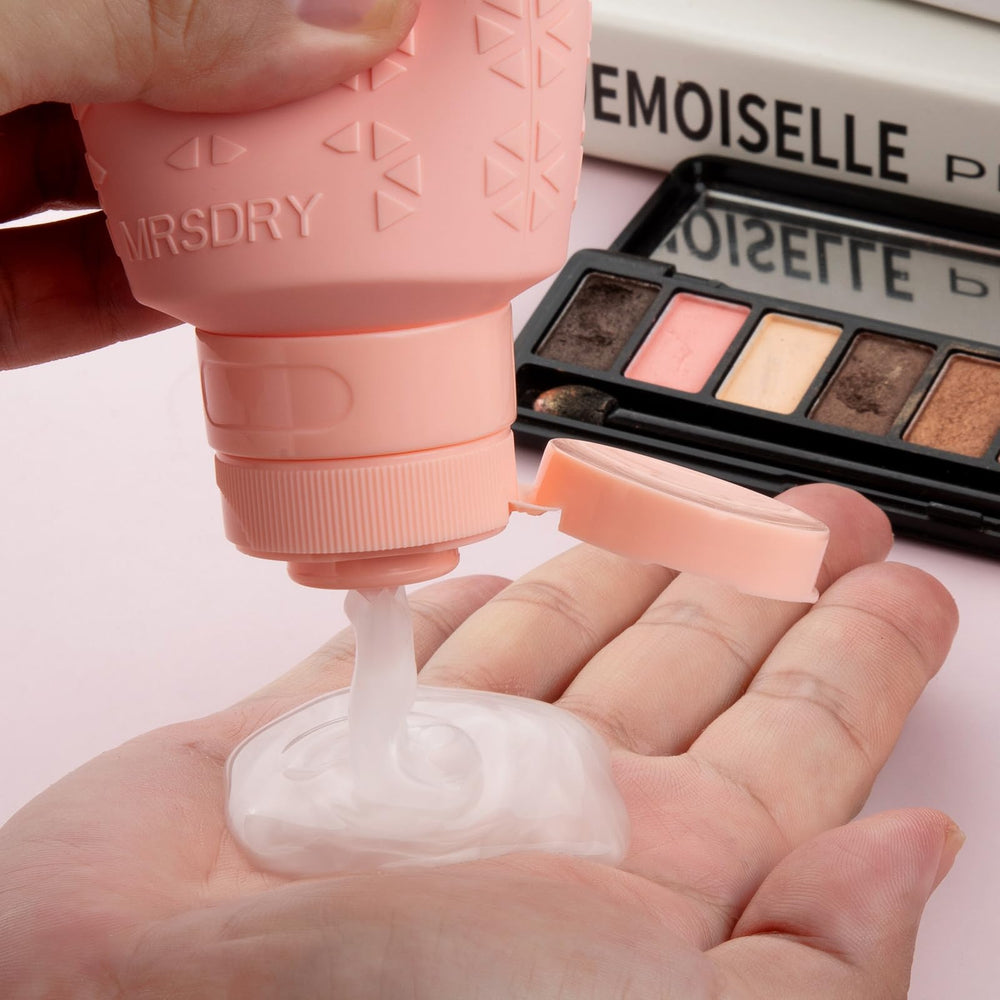 Mrsdry bottle squeezed demonstrating soft silicone controlled dispensing