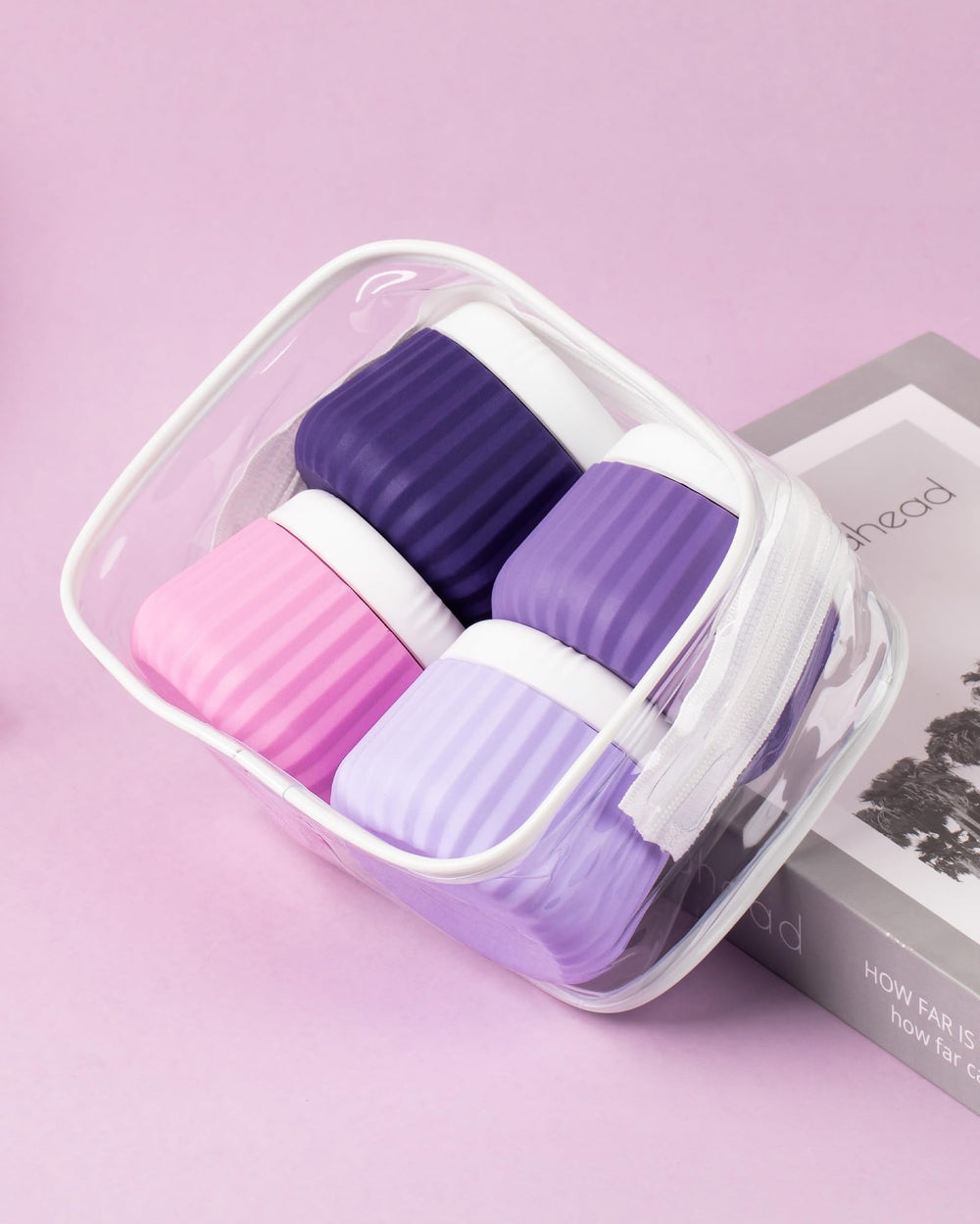 Mrsdry zipped clear pouch placed on suitcase illustrating space-saving packing benefit