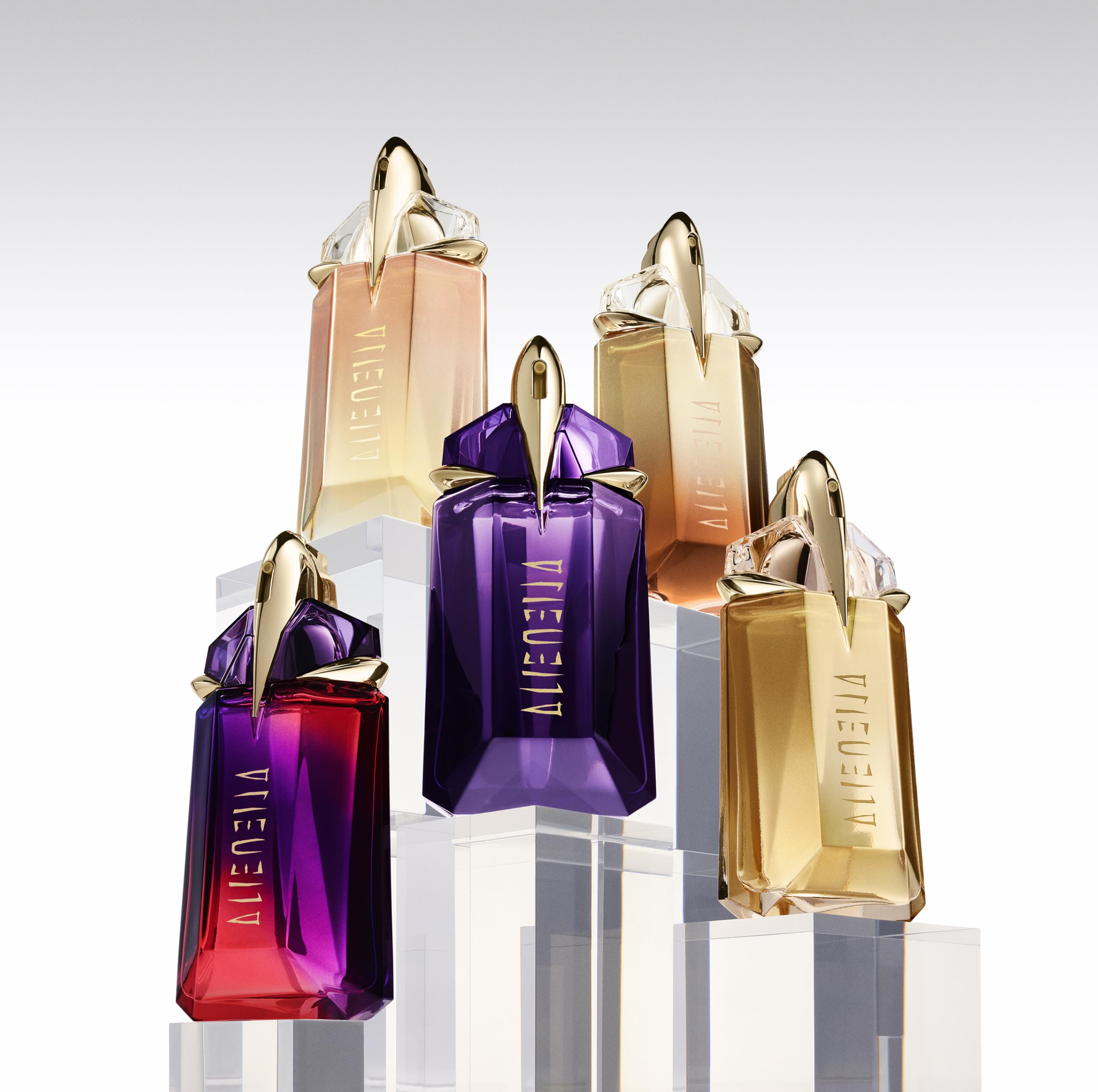 Mugler Alien Goddess on vanity with accessories showing lifestyle elegance benefit
