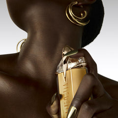 Mugler side glass profile demonstrating bottle shape and premium finish