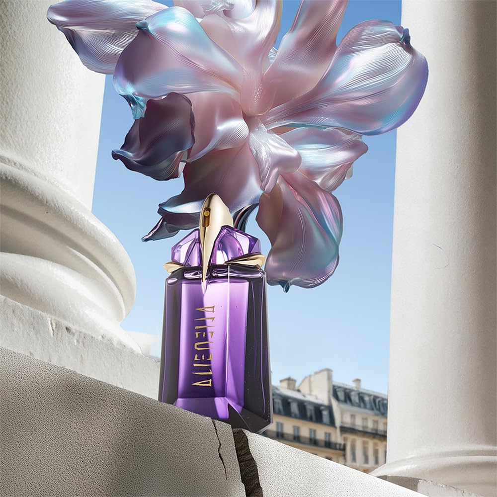 Mugler minis inside a travel clutch, compact set ideal for trips and carry-on