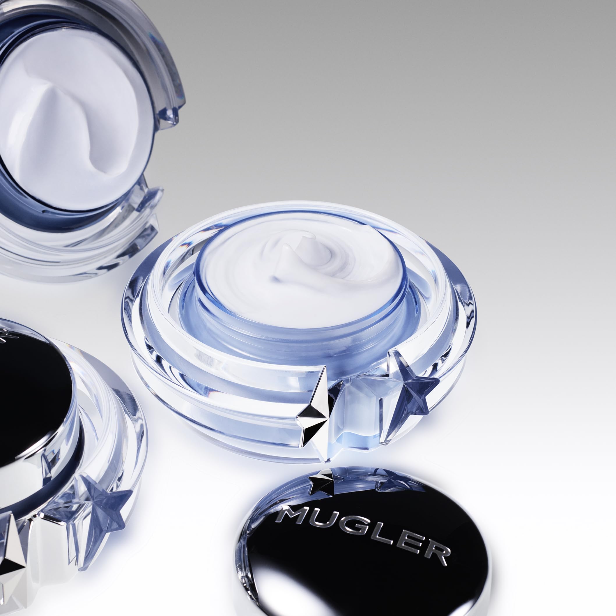 Mugler Angel jar star detail highlighting Mugler branding and collectible design