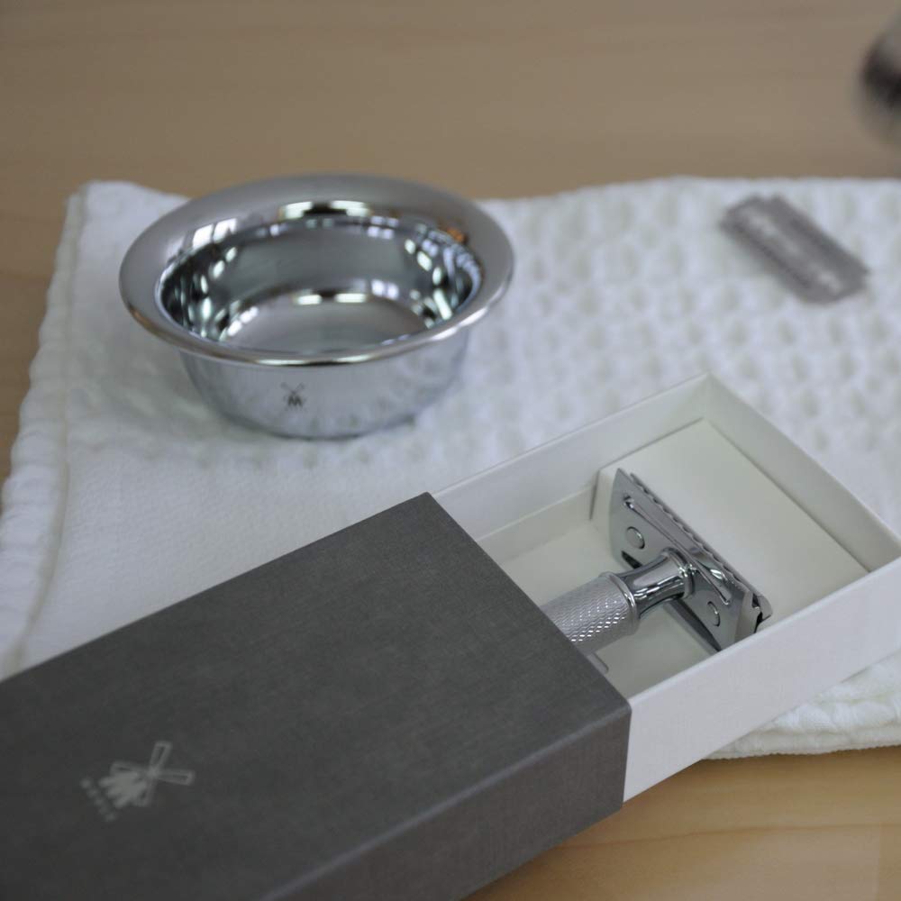 MÜHLE R41 held in hand to show scale and weight for effortless shaving