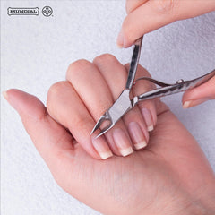 Mundial pliers inside manicure kit showing correct size and professional readiness