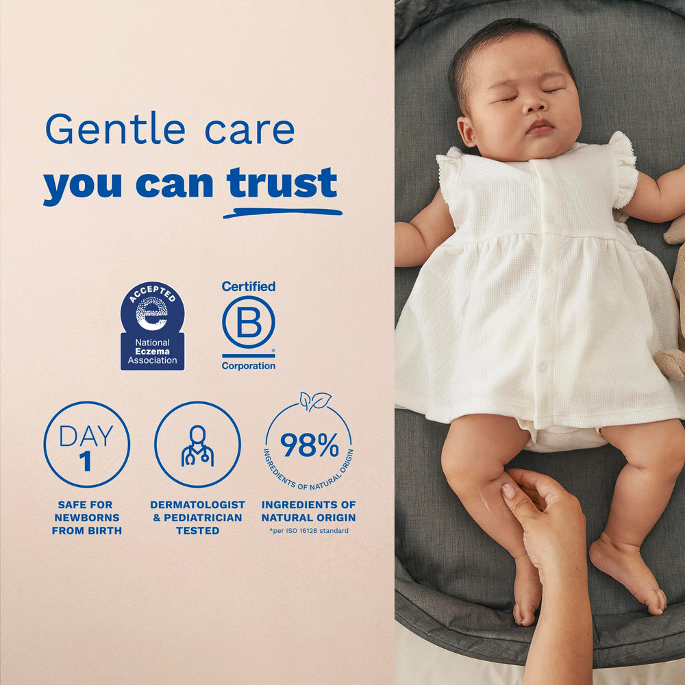 Mustela applying cream to baby's diaper area showing soothing protection