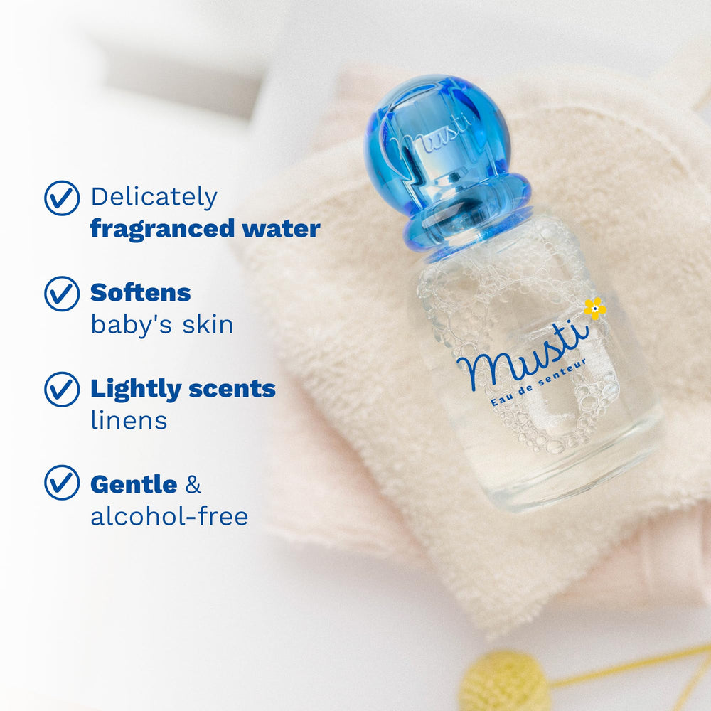 Mustela bottle beside pacifier showing small 1.69 fl oz travel-friendly size