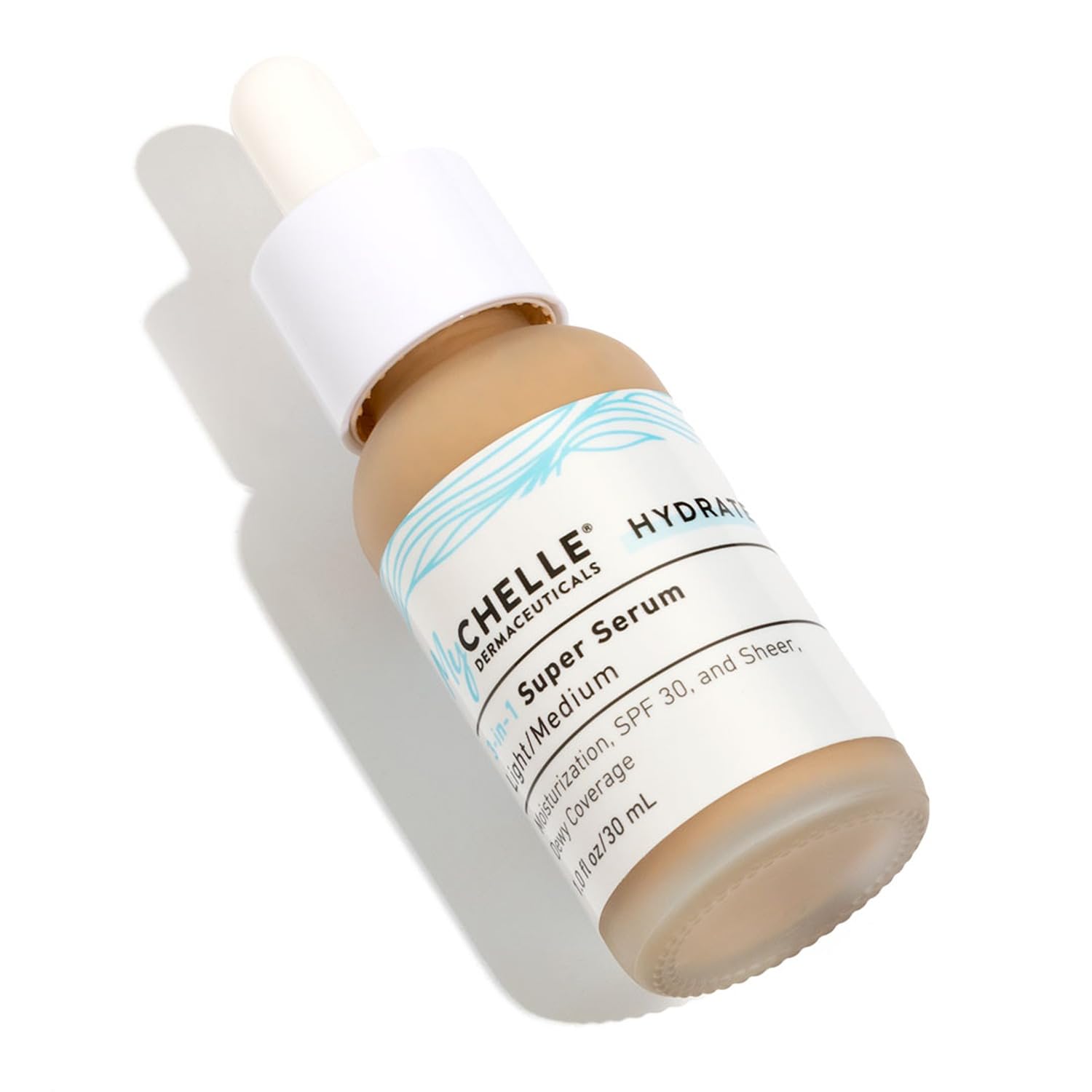MyChelle front packaging showing tinted 3-in-1 serum and clean formulation benefit