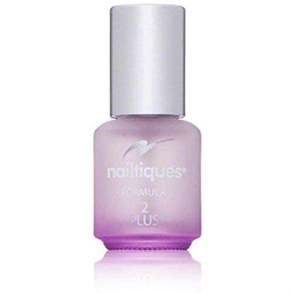 Nailtiques close-up of brush applying treatment for stronger nails
