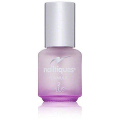 Nailtiques close-up of brush applying treatment for stronger nails