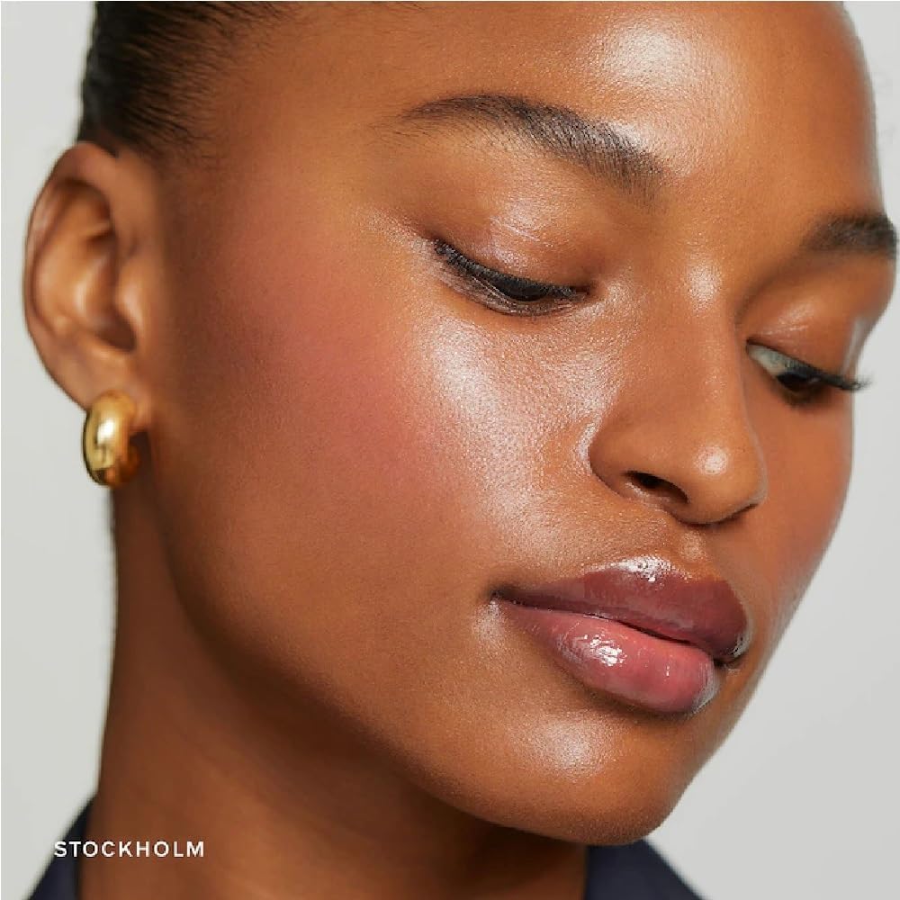 NAPH flush balm applied on lips and cheeks demonstrating dewy, cohesive tint look