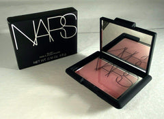 NARS ORGASM pan close-up texture revealing fine-milled powder and blendability