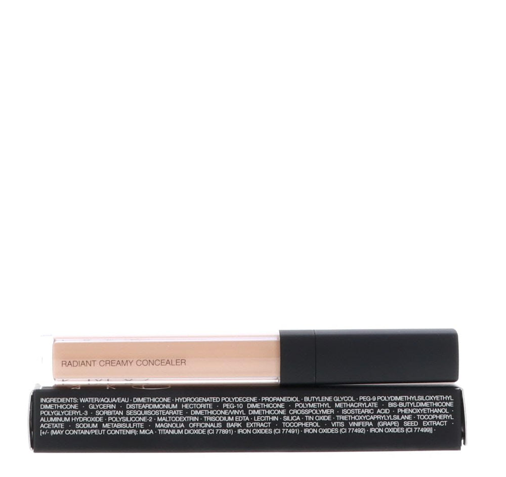 NARS concealer next to everyday items showing compact size and travel convenience