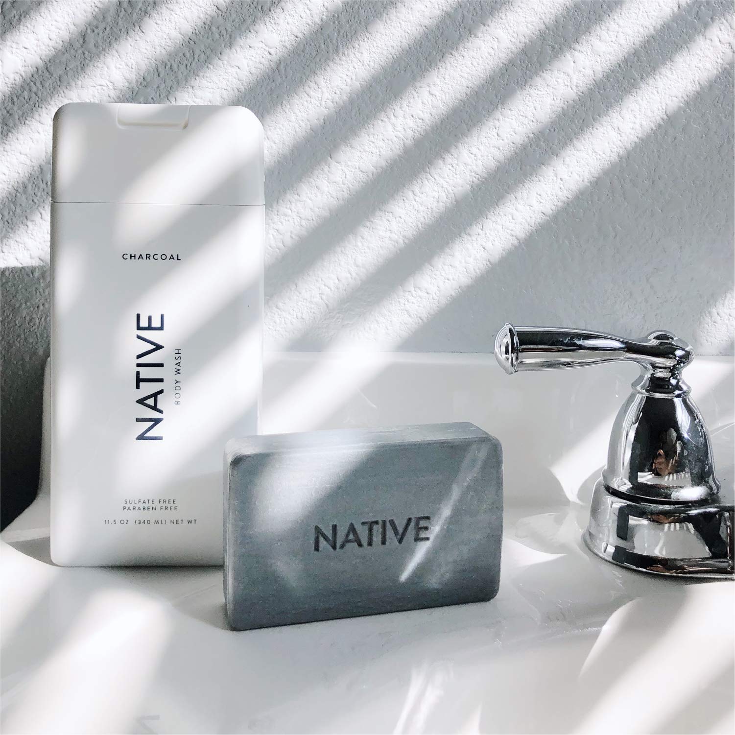Native bottles styled in bathroom lifestyle setting conveying calm routine