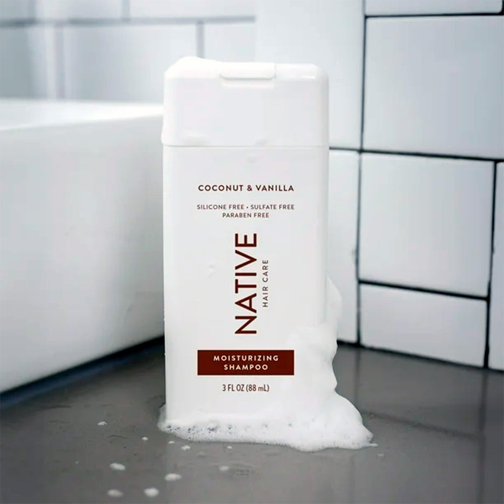 Native bottle placed on bath shelf conveying organized bathroom benefit