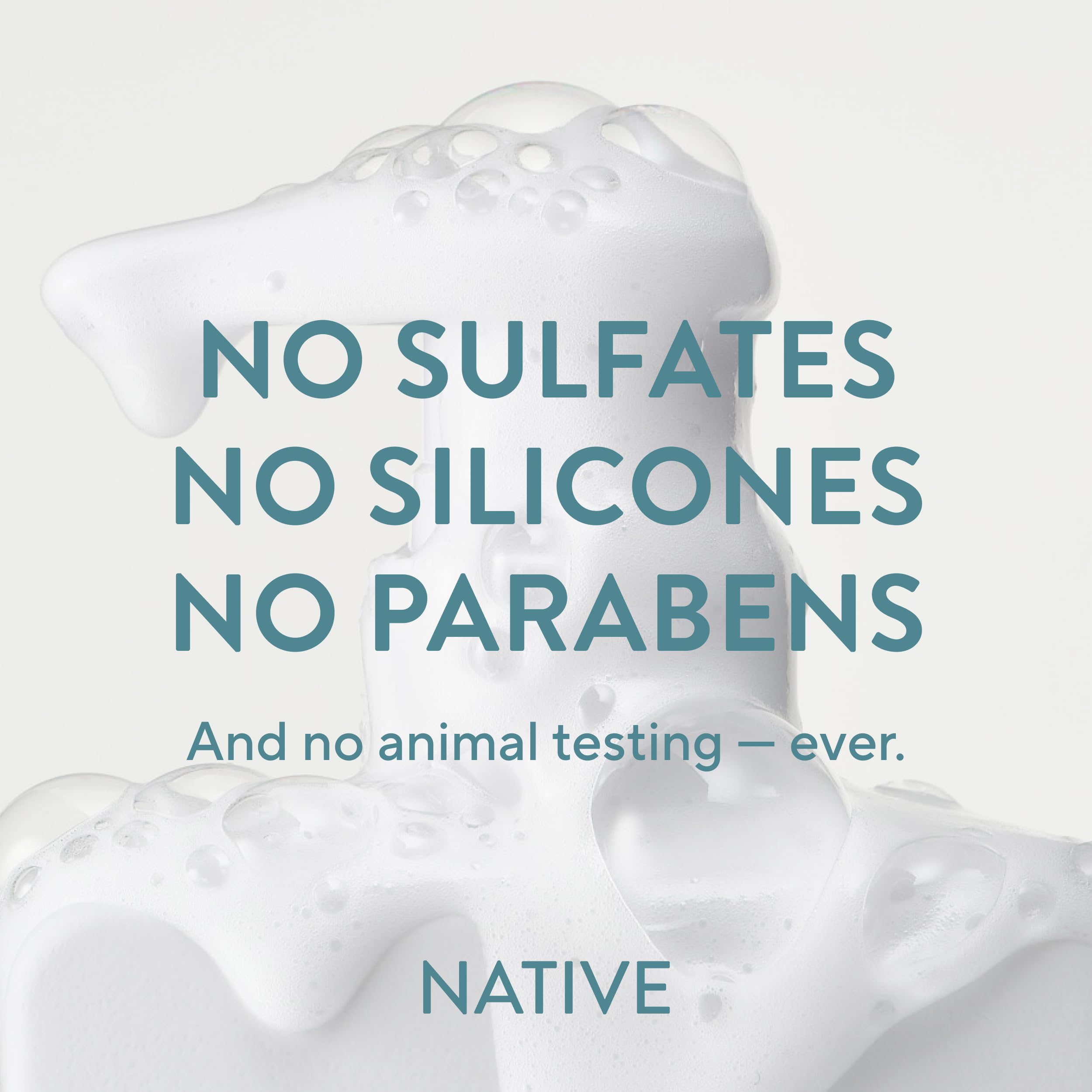 Native duo in shower lathering hair, demonstrating cleansing and conditioning