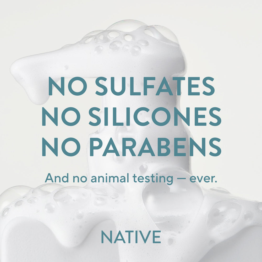Native duo in shower lathering hair, demonstrating cleansing and conditioning