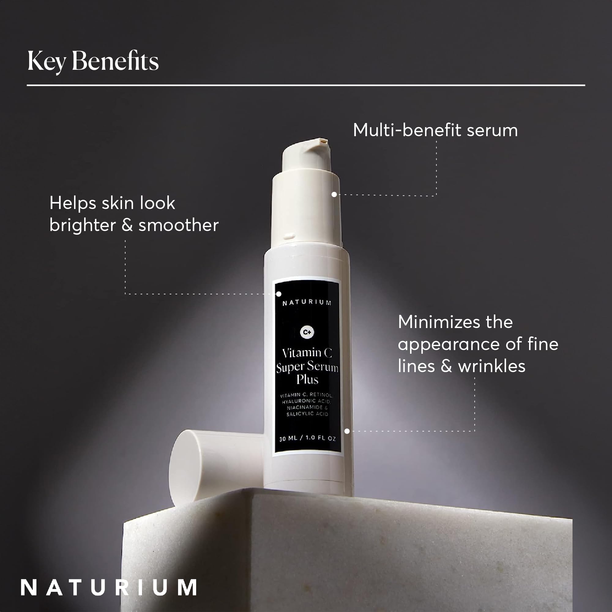 Naturium serum being applied to face by model showing even coverage and absorbency