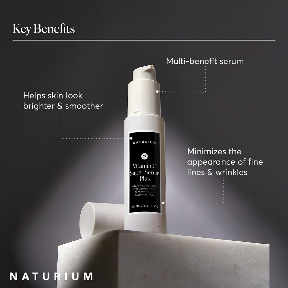 Naturium serum being applied to face by model showing even coverage and absorbency