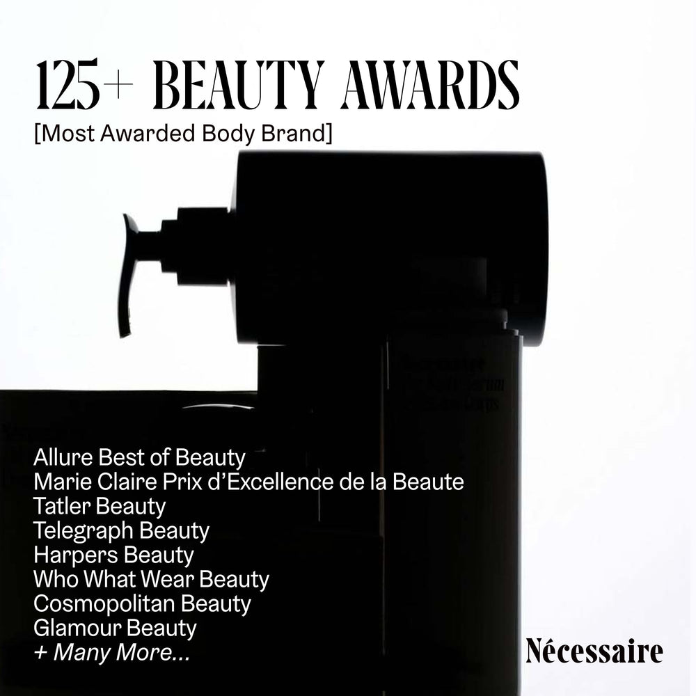 Nécessaire bottle beside towel for scale to show practical size for bathroom