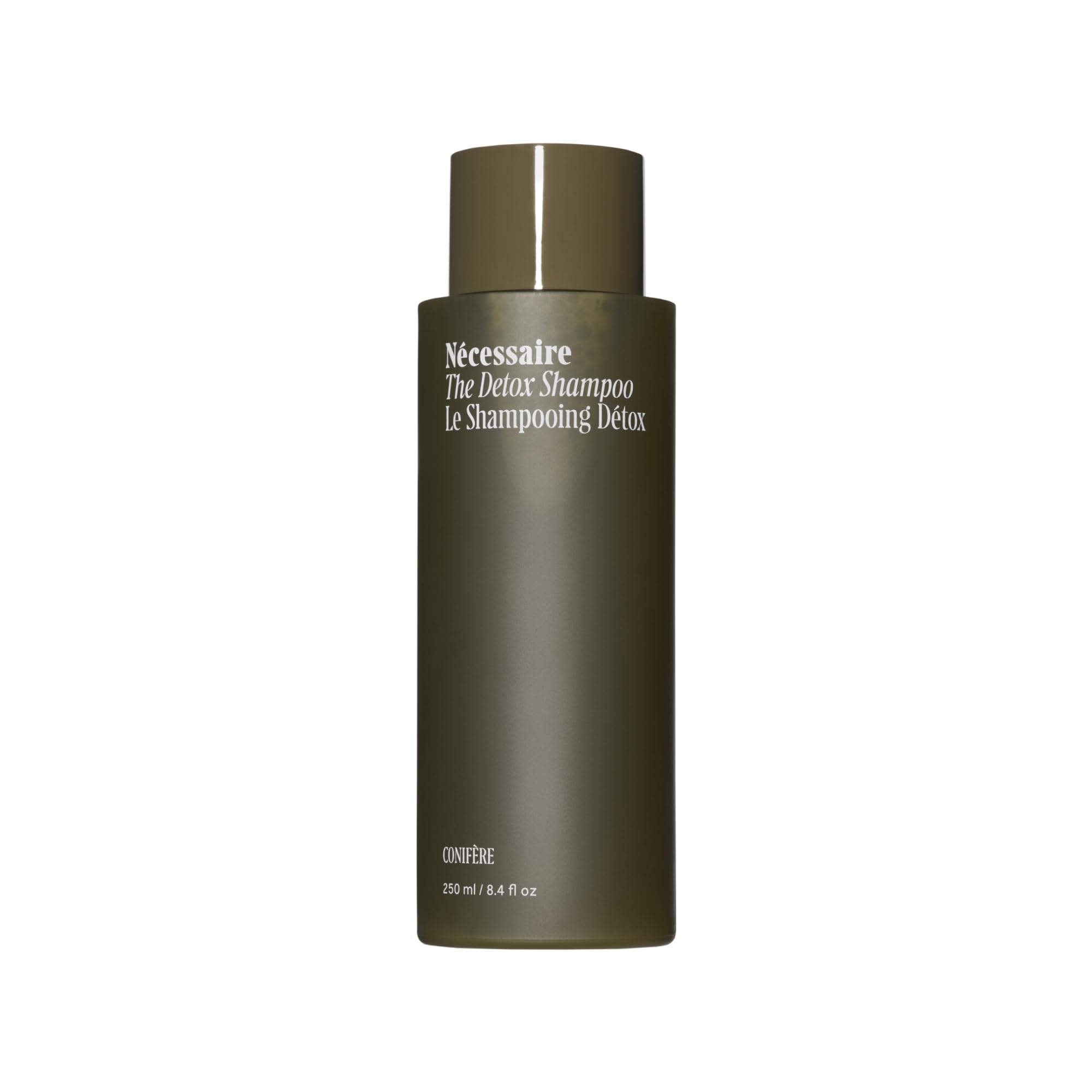 Nécessaire front bottle shot showing minimalist design and clarifying benefit