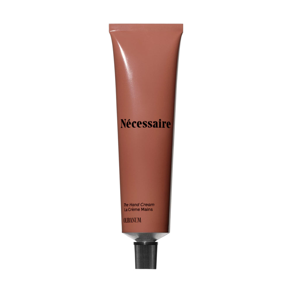 Nécessaire front packaging showing hand cream and brand clarity, boosts confidence