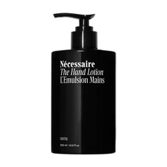 Nécessaire front packaging showing bottle and branding, highlighting clean design and convenience