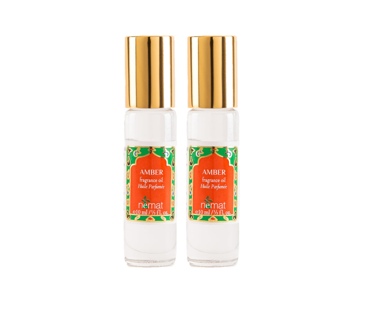 Nemat International amber roll-on front packaging showing elegant glass bottles and labels