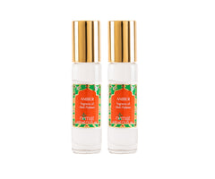 Nemat International amber roll-on front packaging showing elegant glass bottles and labels