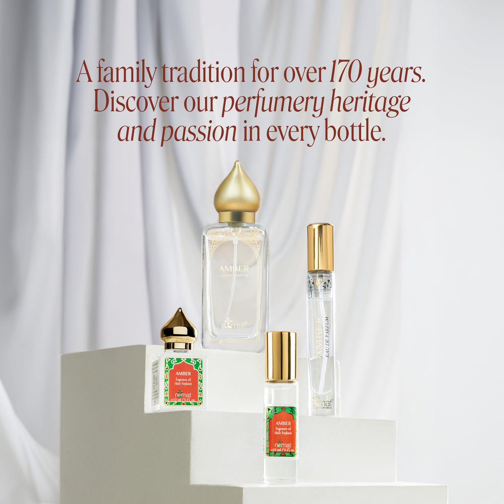 Nemat International roll-on in a handbag lifestyle shot for on-the-go fragrance refresh
