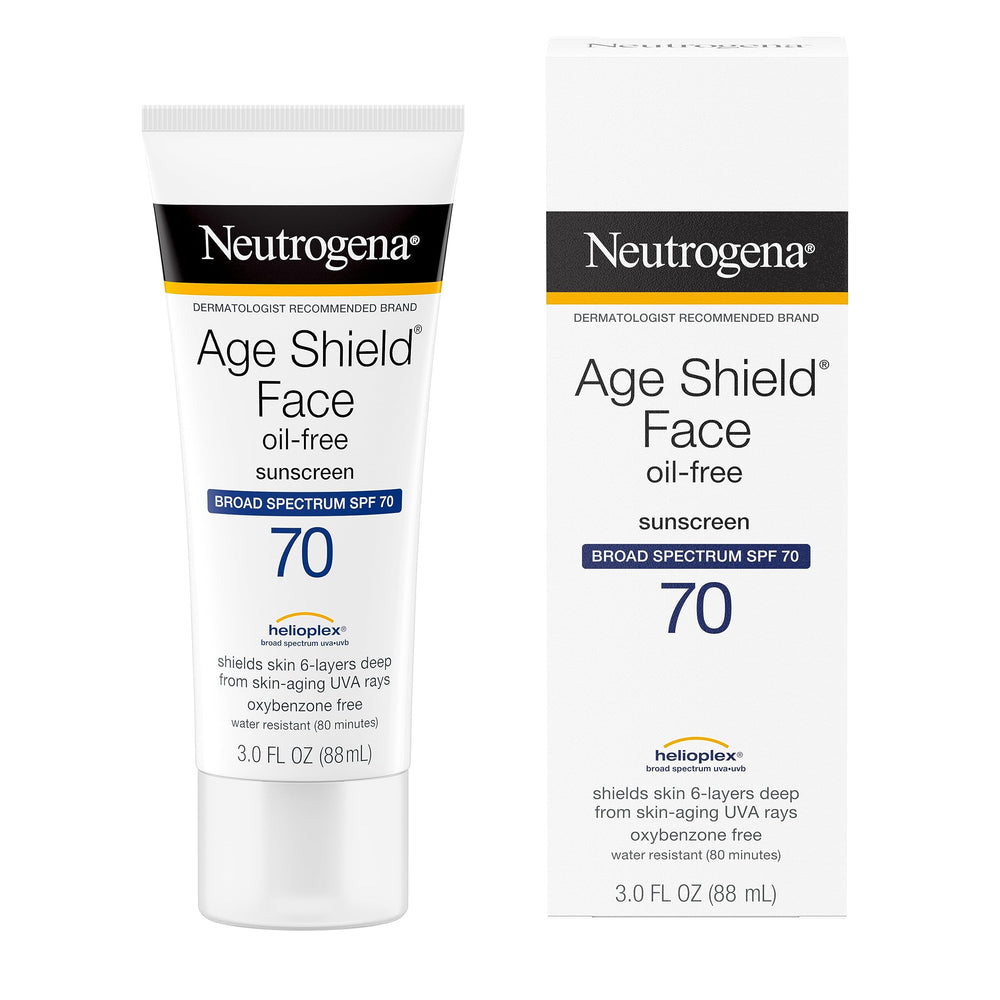 Neutrogena Age Shield tube beside keys showing travel-friendly size