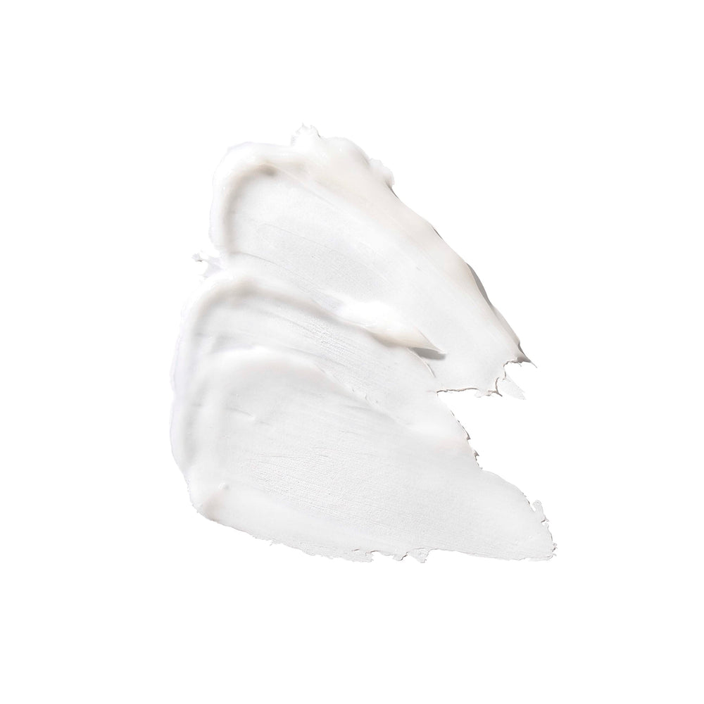 Applying Neutrogena cream to hand to demonstrate spreadability and moisturizing effect